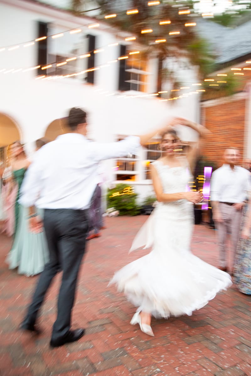 dancing on the back patio at a weymouth center wedding in Southern Pines