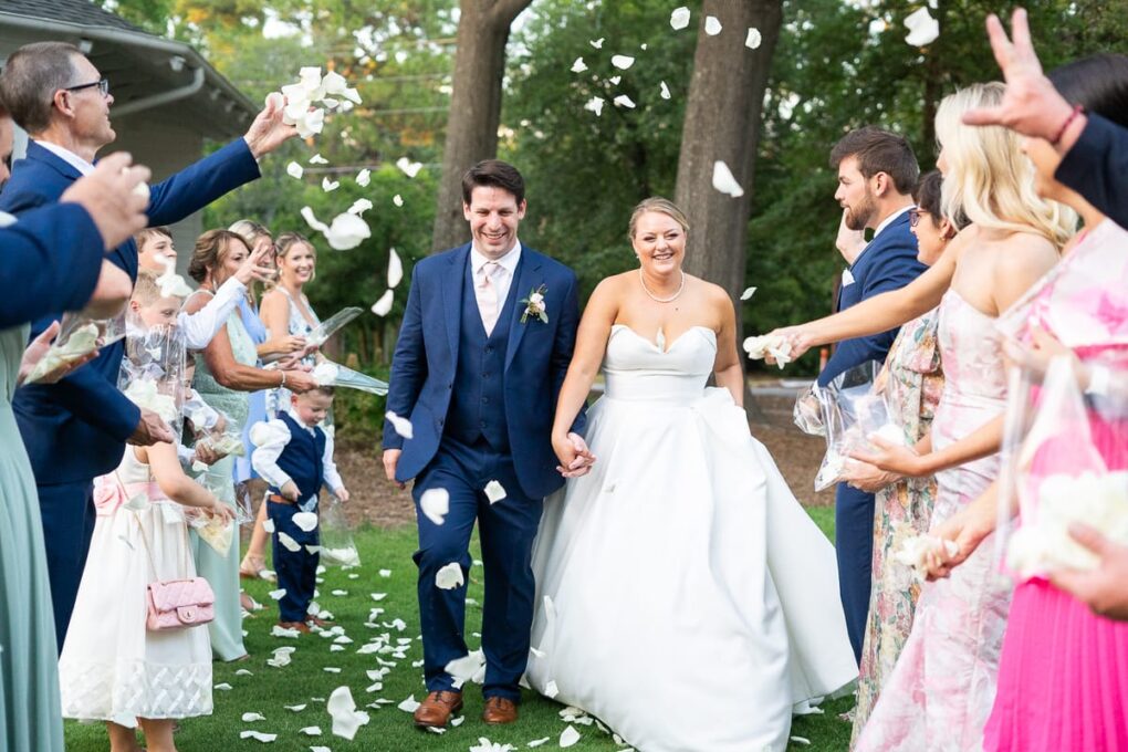 Bride and groom exiting ceremony at NC wedding by Mollie Tobias Photography