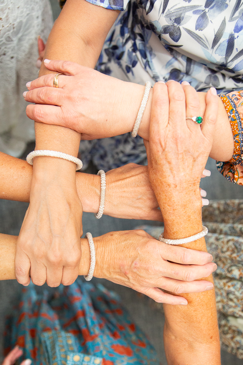 matching bracelets at Forest Creek wedding reception