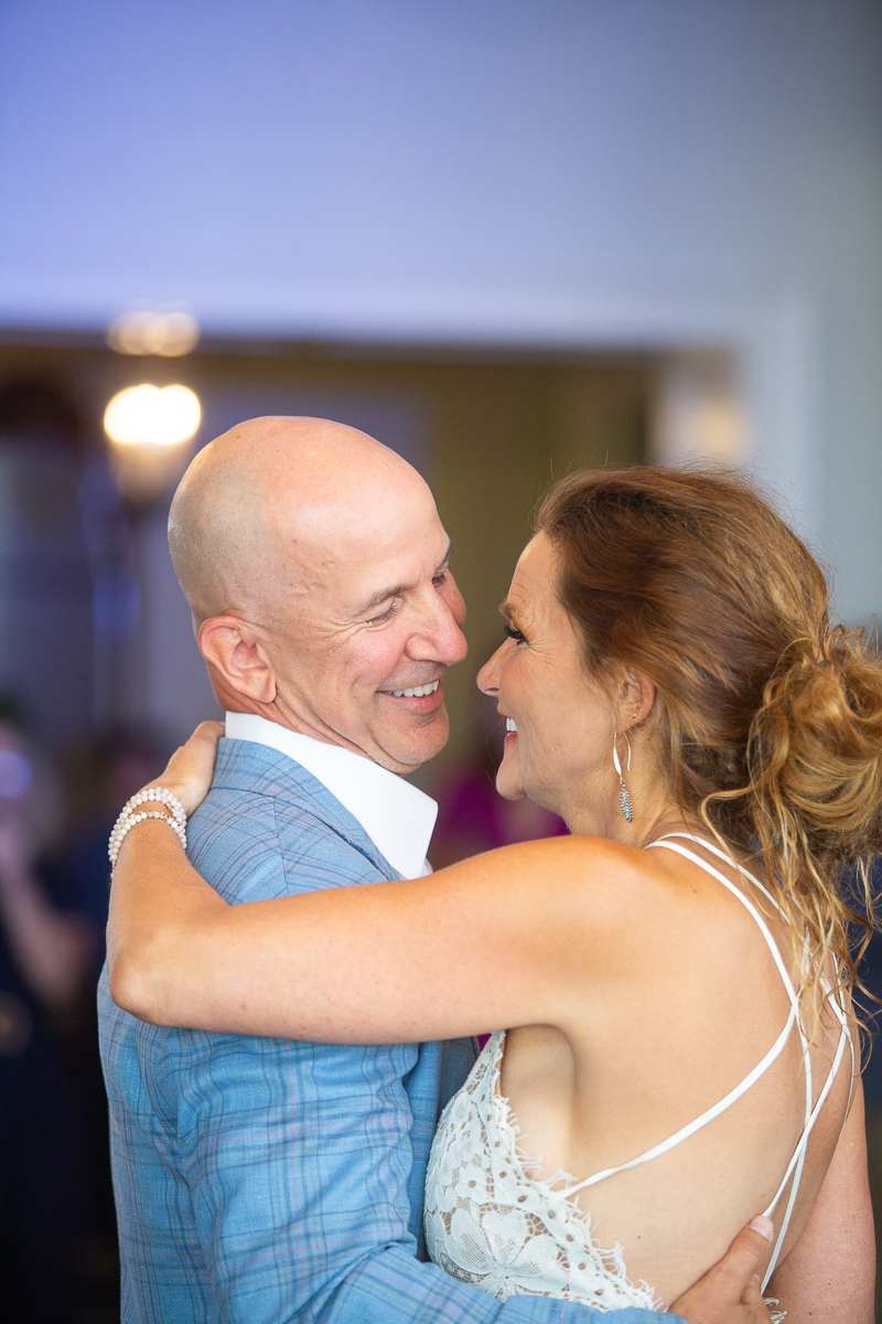 Bride and groom dancing by North Carolina wedding photographer