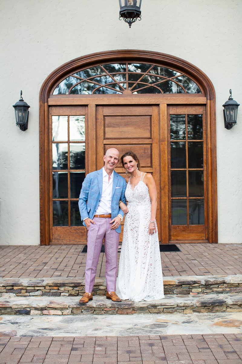 Couple smiling by North Carolina wedding photographer