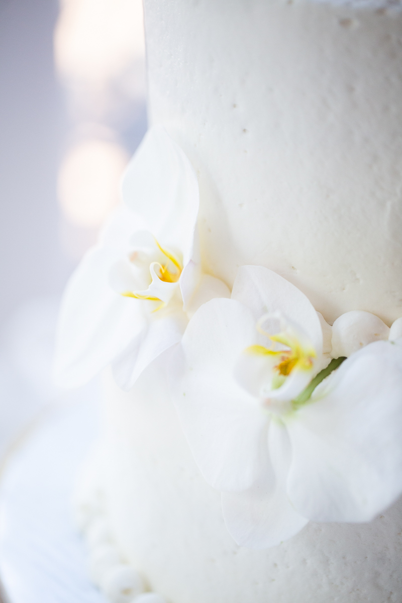 White orchid wedding cake by Pinehurst photographer