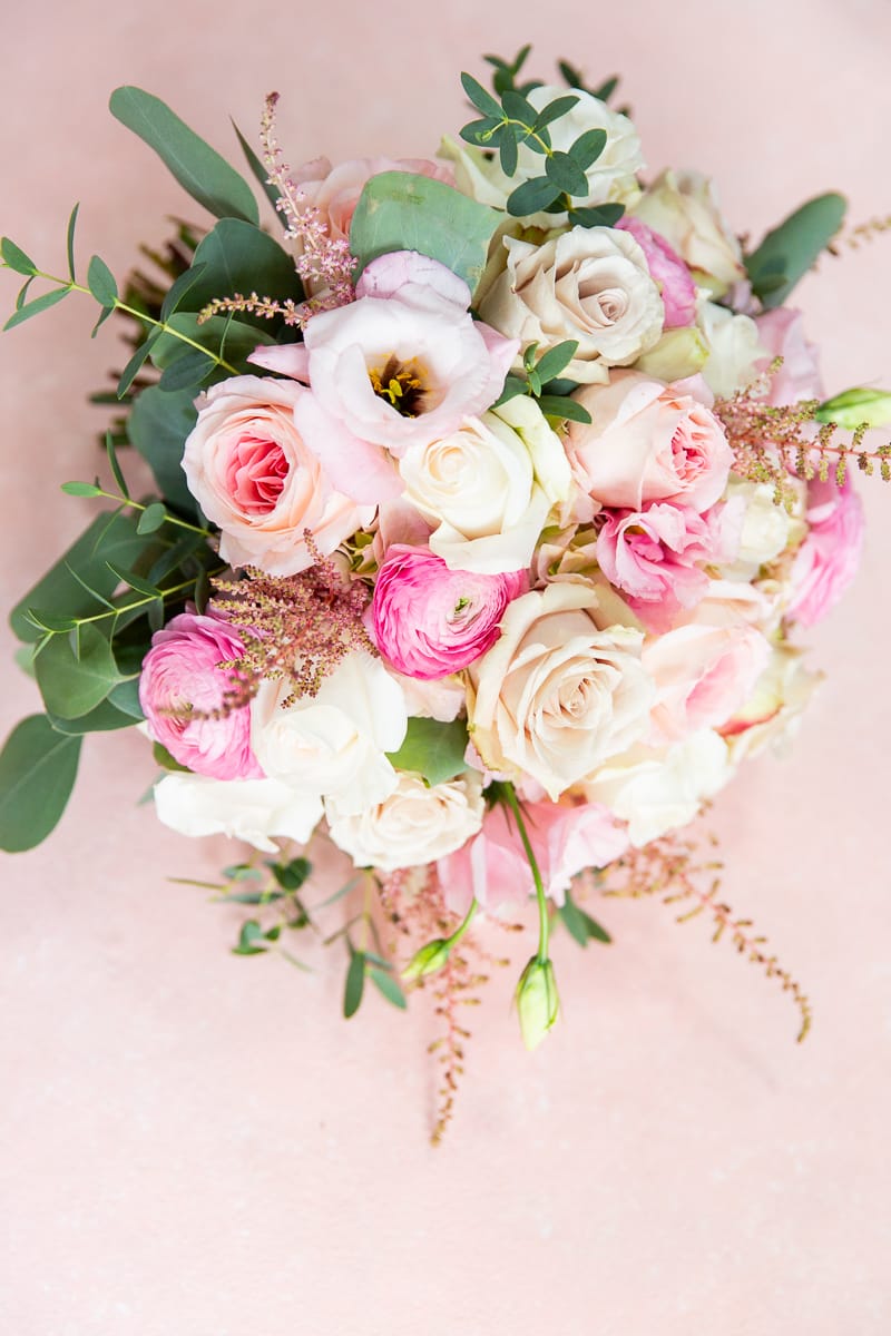 Stunning wedding bouquet with roses and greenery at Pinehurst.