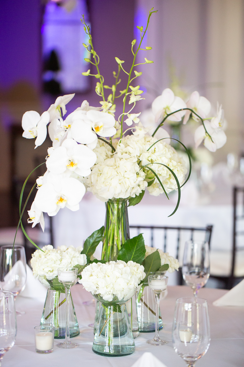 white wedding centerpieces at wedding at Forest Creek