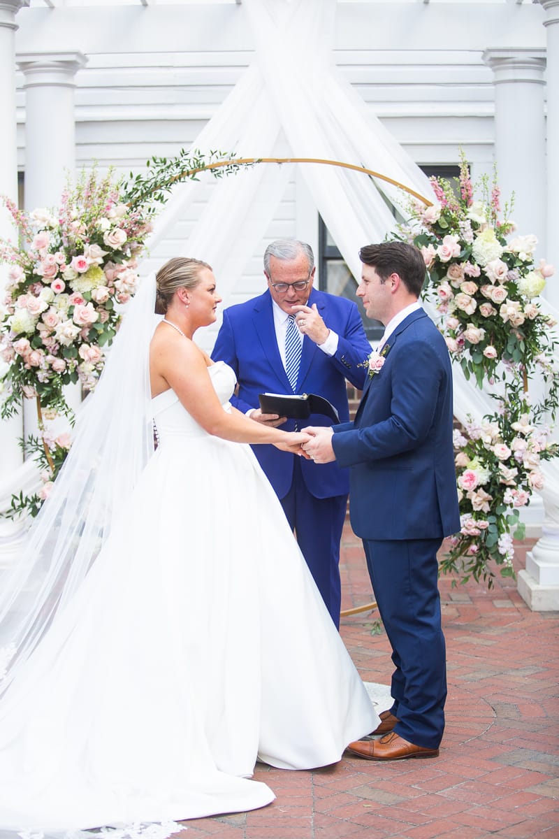 Bride and groom saying vows at Pinehurst wedding