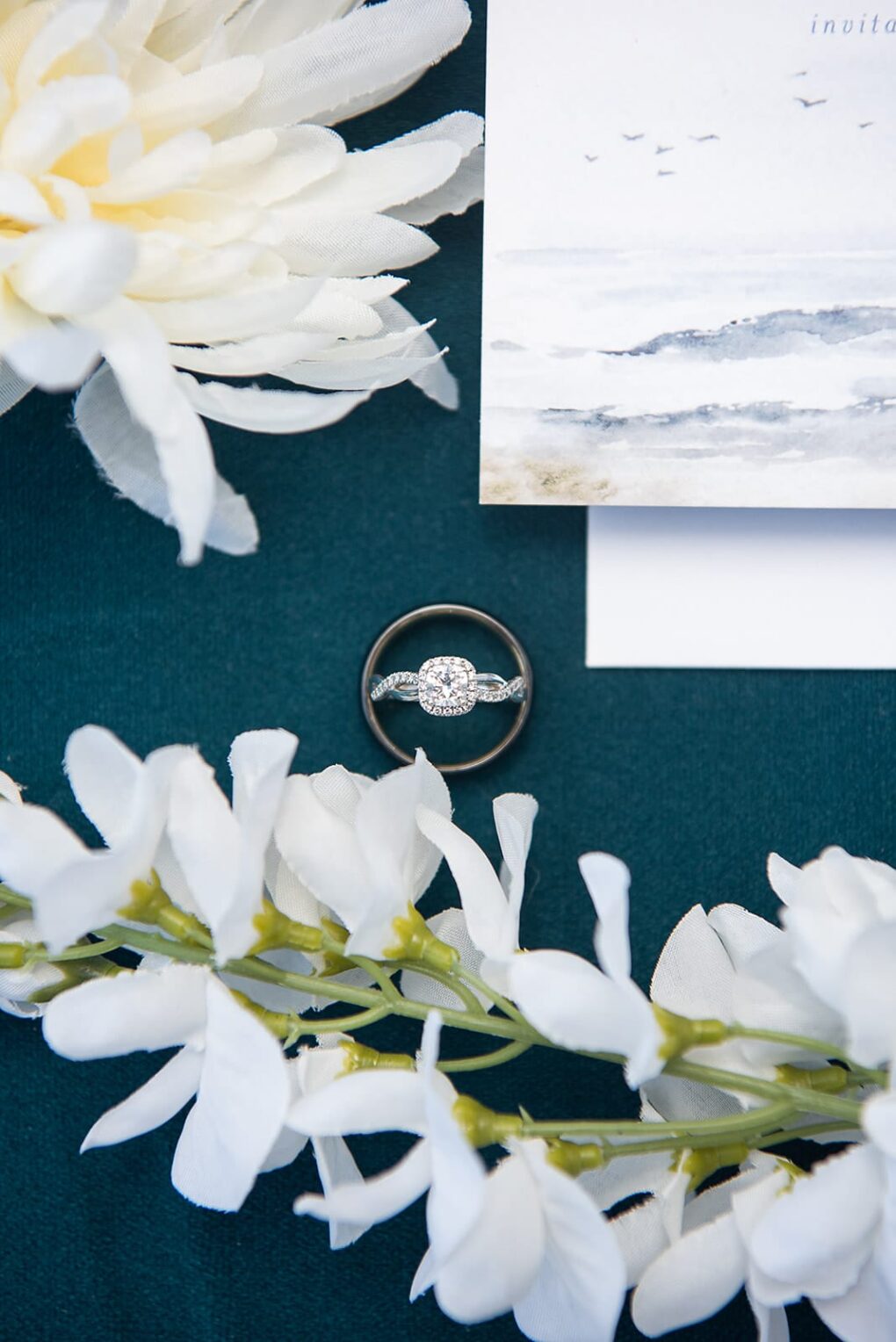 wedding ring with teal and white wedding florals