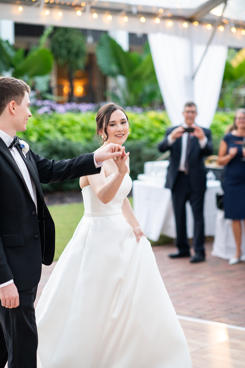 Bride and groom sharing a dance during their reception at the Country Club of North Carolina.