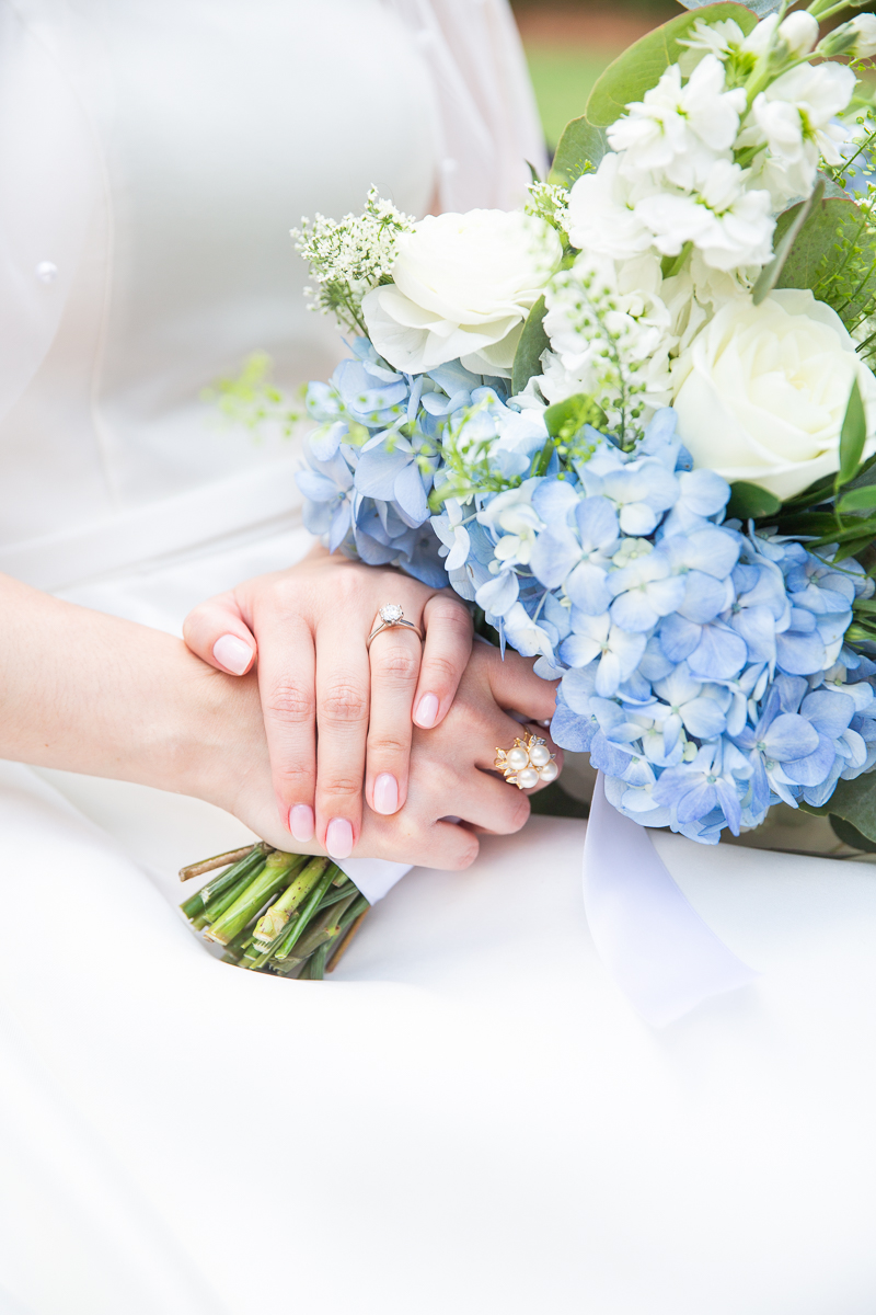 Bride holding the bouquet at a Pinehurst wedding.