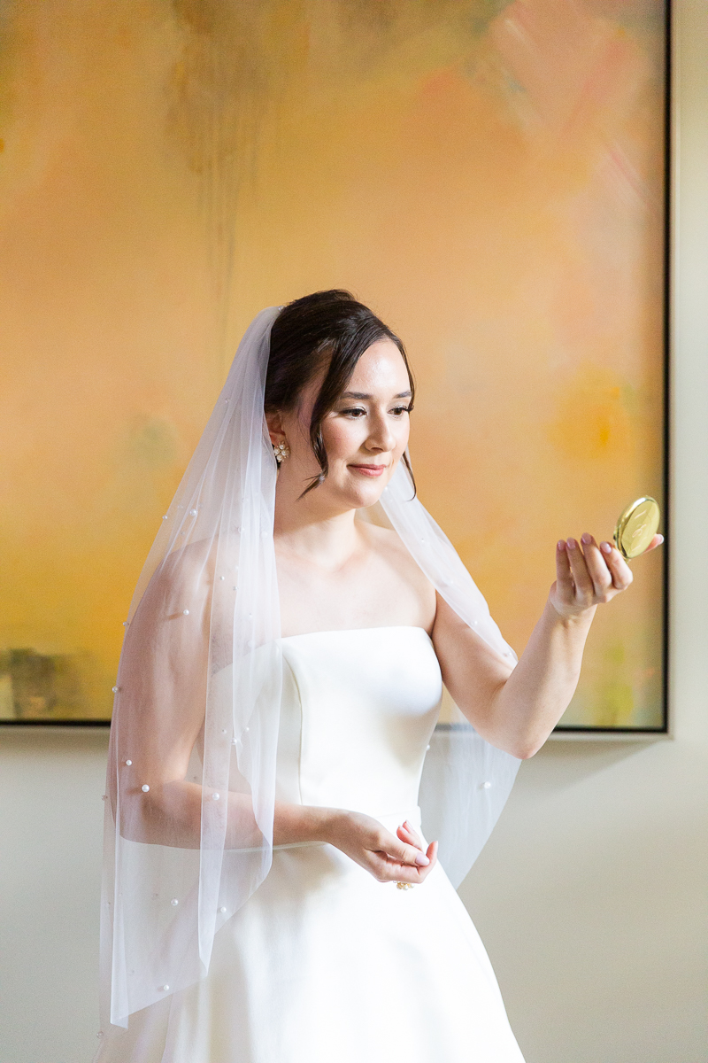 Elegant bridal portrait with a veil and classic pose at a wedding in Pinehurst, North Carolina.